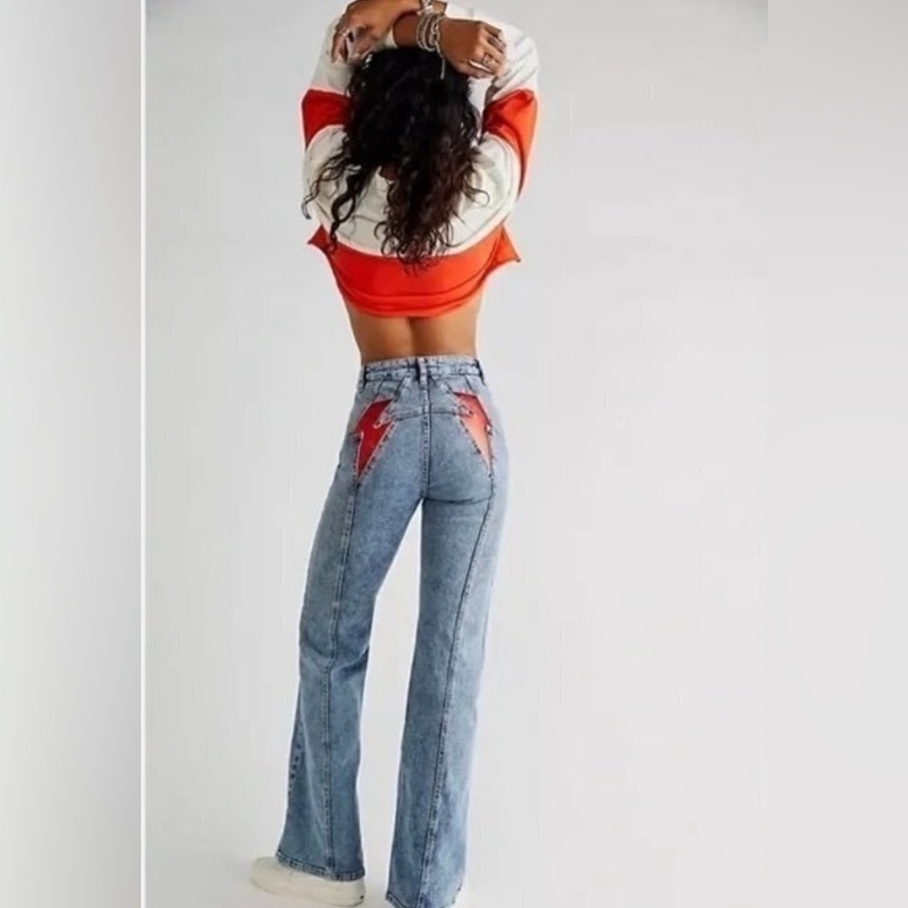 Free People High-Rise Light Wash Jeans with Red Lightning Detail
